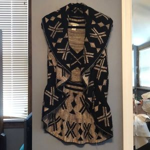 Sleeveless oversized sweater